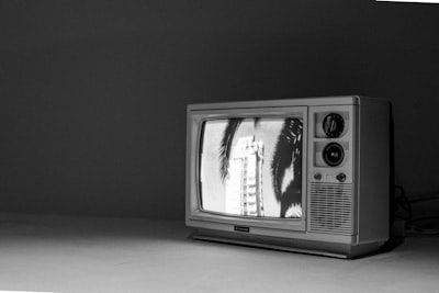 a black and white photo of an old tv