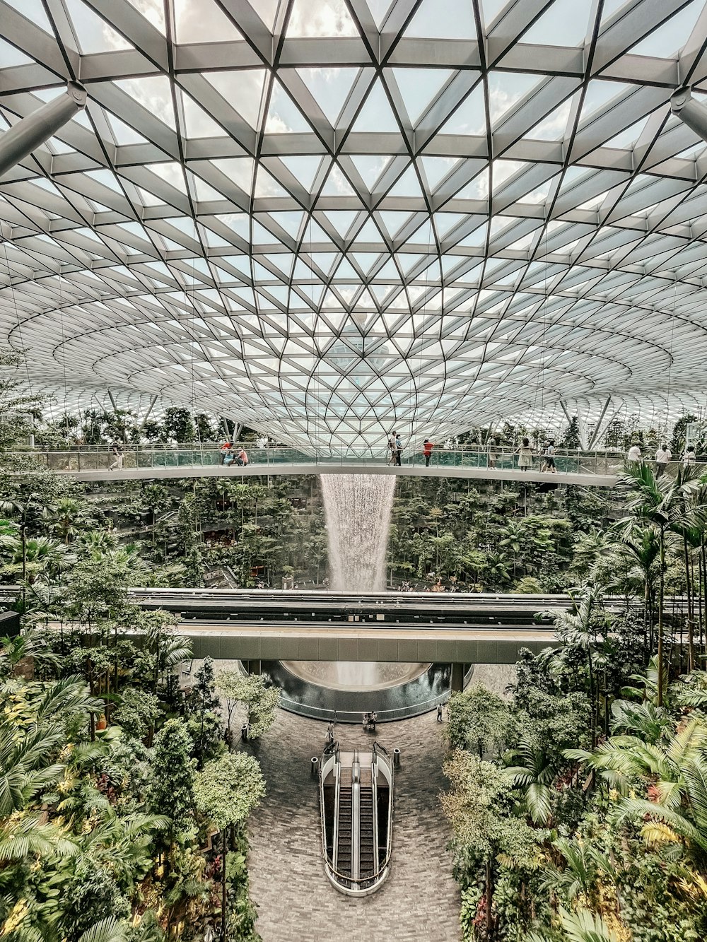 a large building with a waterfall inside of it