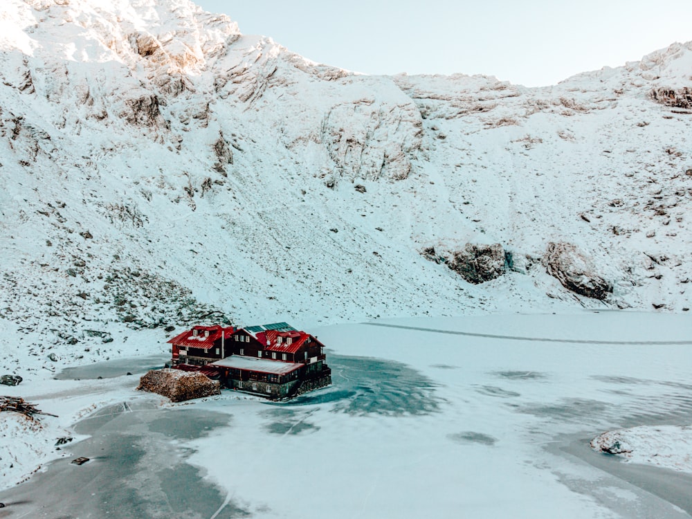 a house in the middle of a frozen lake