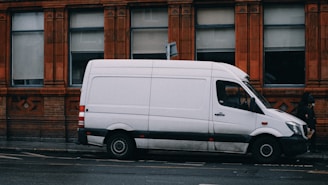a white van parked on the side of the road