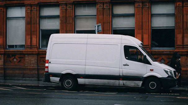 a white van parked on the side of the road