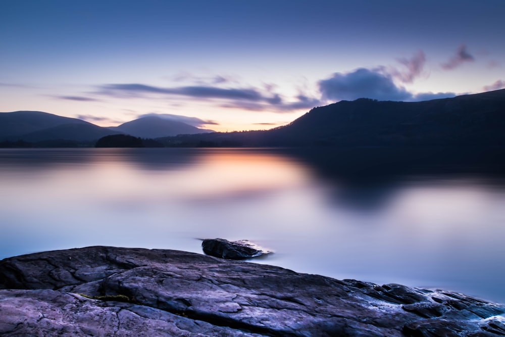 a large body of water surrounded by mountains