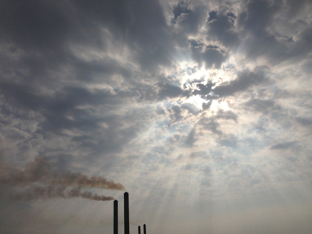 the sun is shining through the clouds in the sky