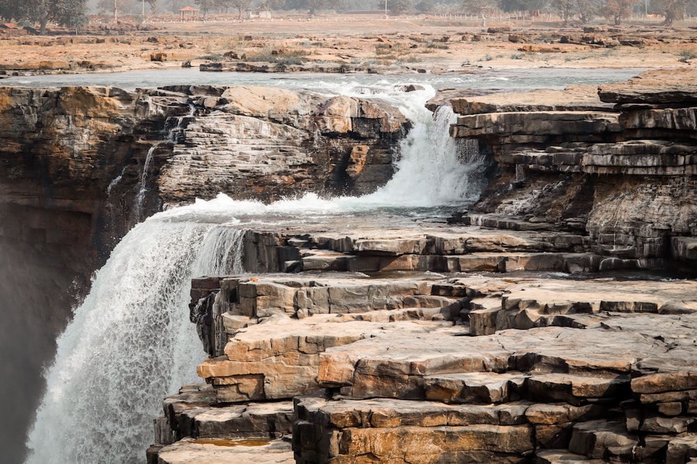 a waterfall with water coming out of it