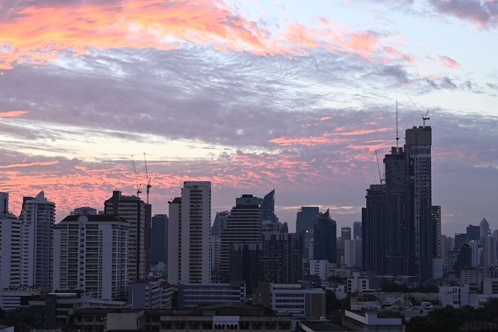 a view of a city with tall buildings