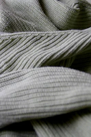 Close-up of breathable, non-transparent fabric detail from Sopofit leggings.