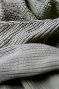 Close-up of breathable, stretch fabric in vibrant activewear leggings.