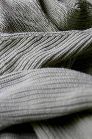 Close-up of a vibrant, breathable activewear top with unique stitching details.