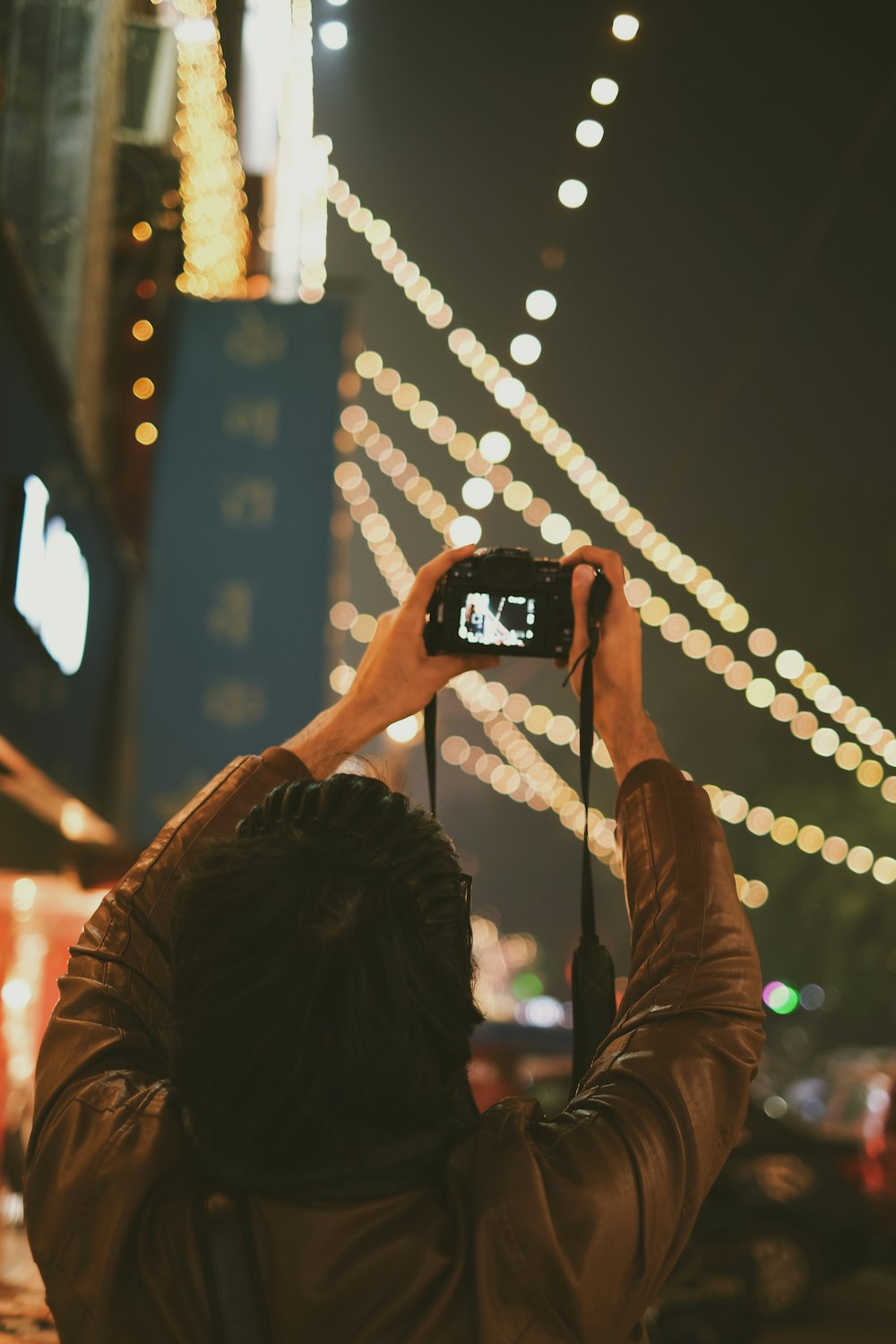 a person taking a picture with a camera