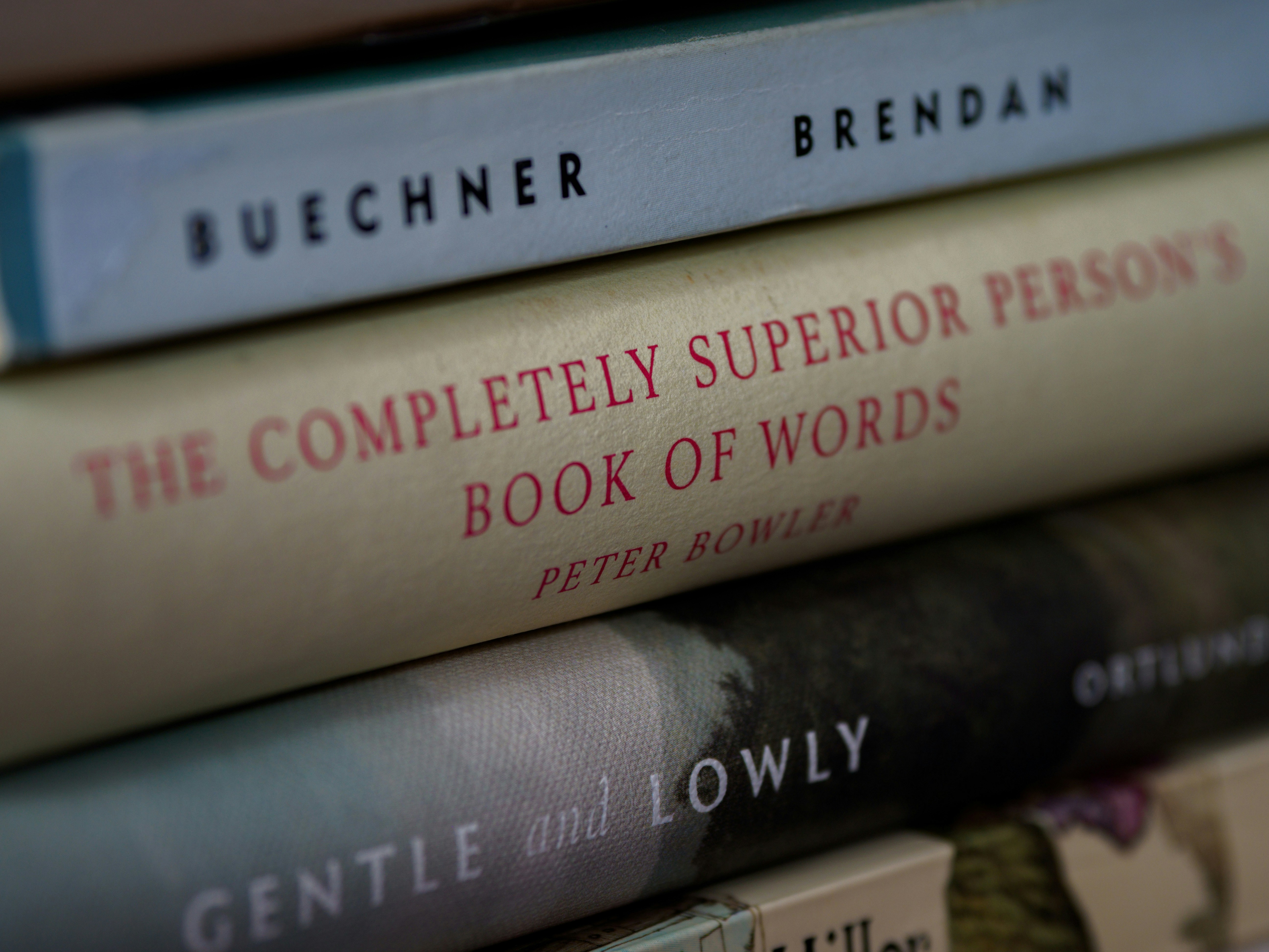 a stack of books sitting on top of each other