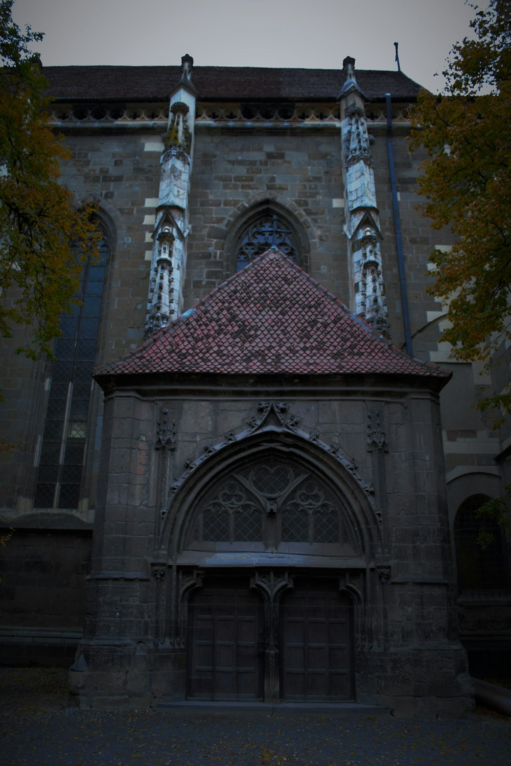 an old building with a clock on the front of it