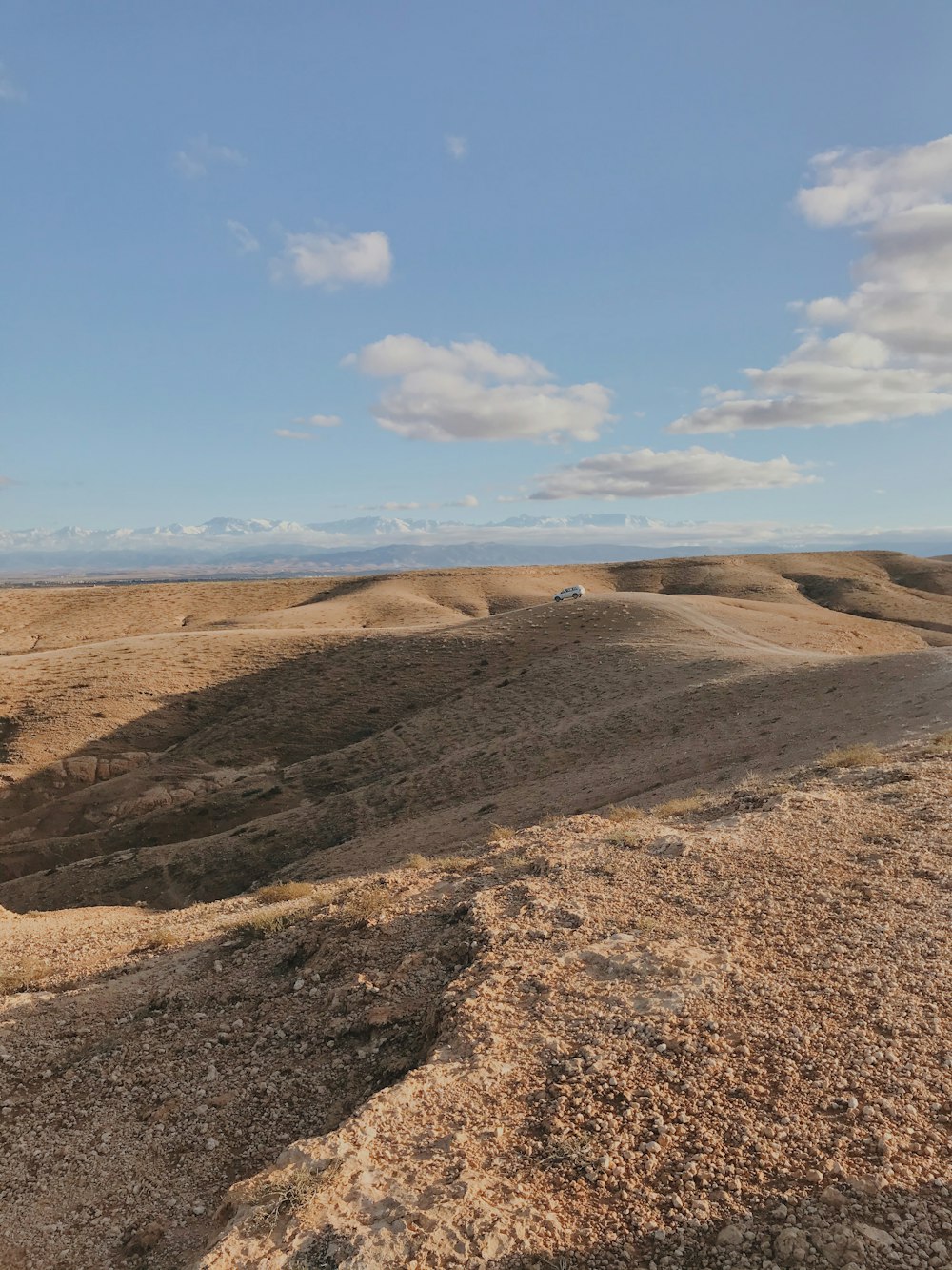 a view of a dirt road in the middle of nowhere