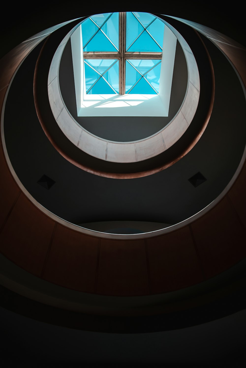 a round window with a skylight above it