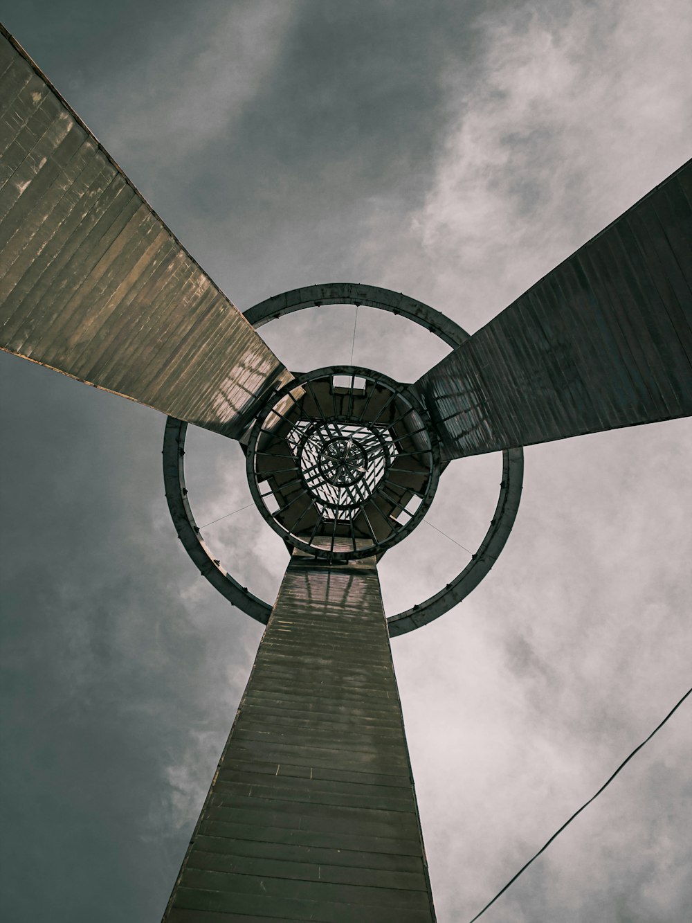 looking up at the top of a tall tower