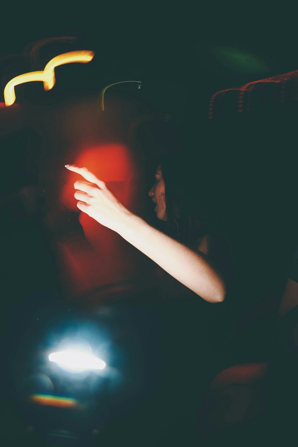 a blurry photo of a person holding a cell phone