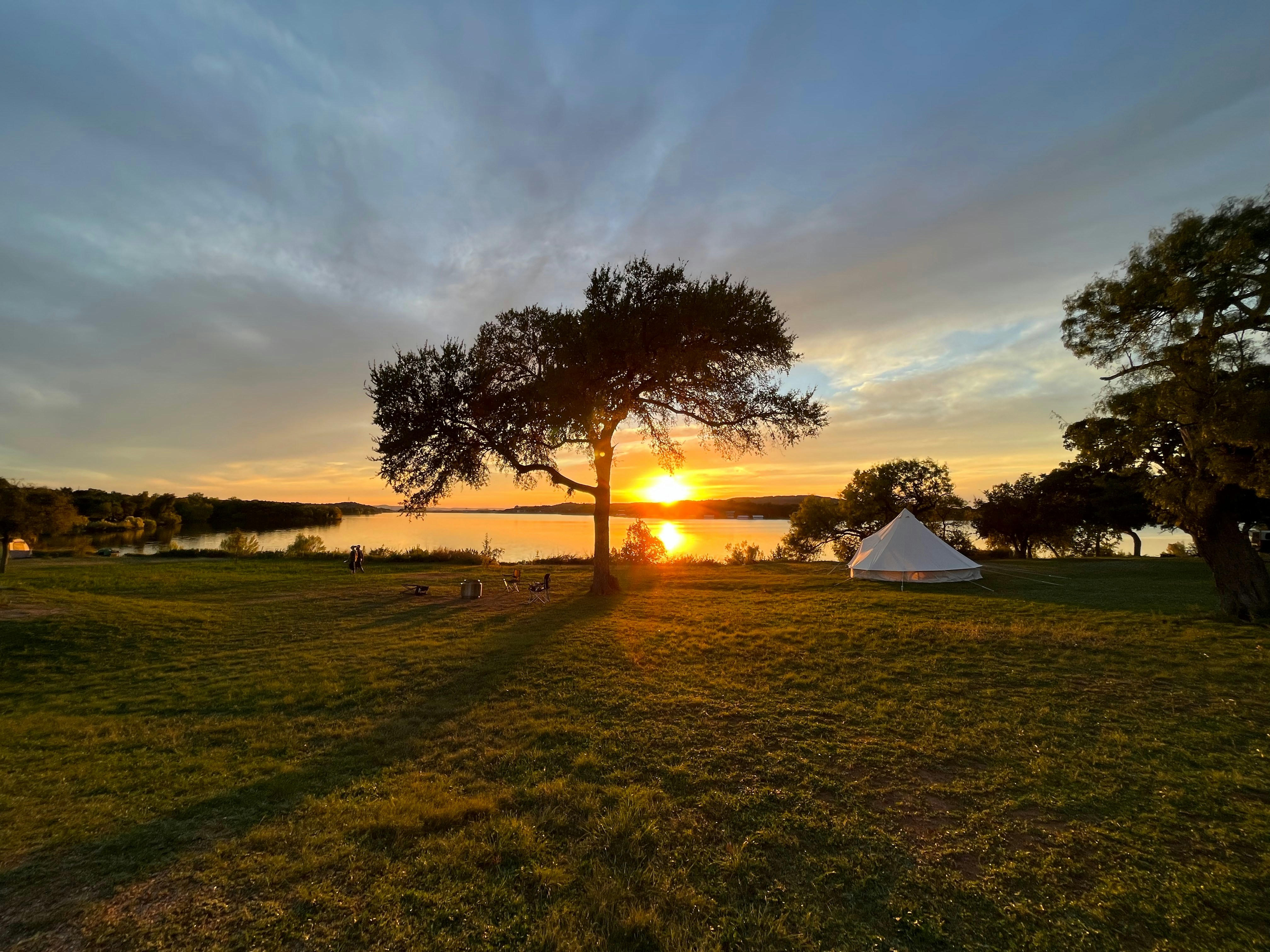 Sunrise over lake campsite