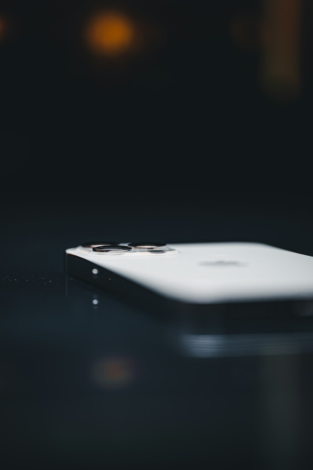 a close up of an apple product on a table