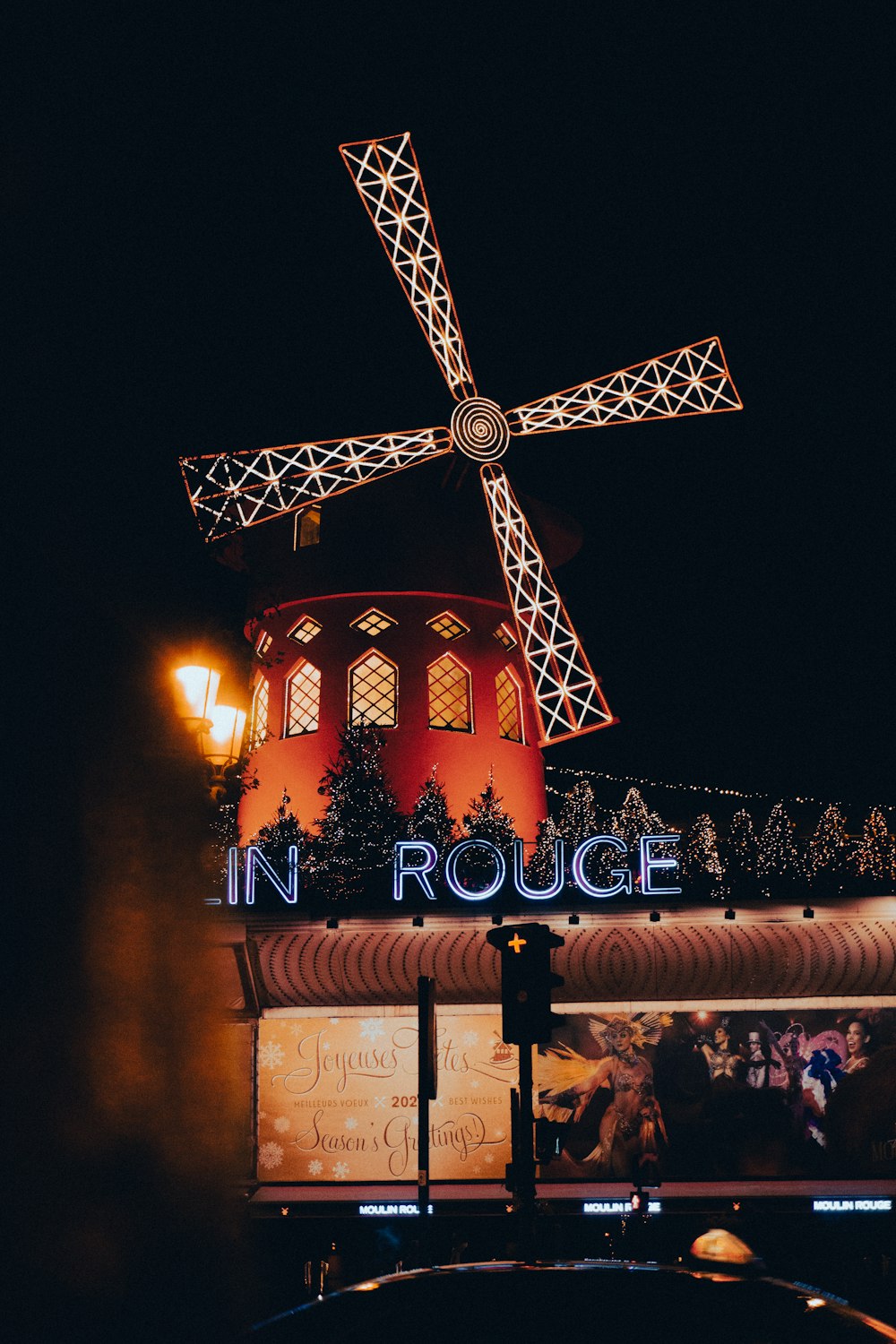 a building with a large windmill on top of it