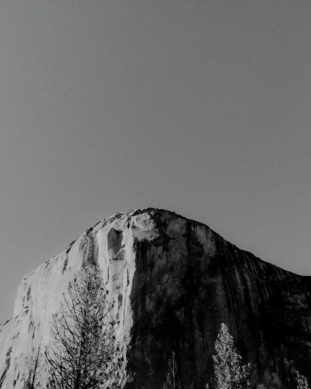 a black and white photo of a mountain