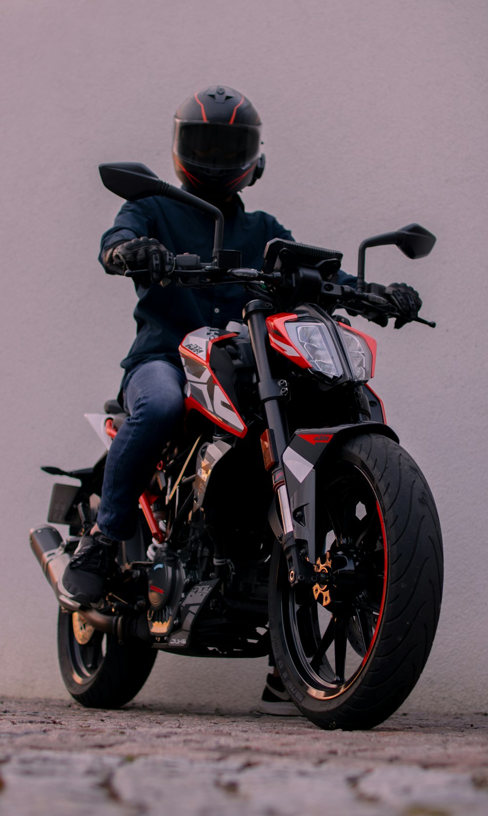 a person on a motorcycle with a helmet on