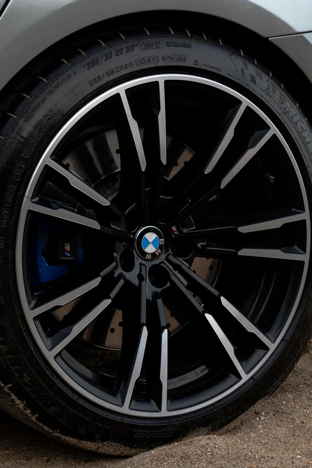 a close up of a bmw wheel on a car