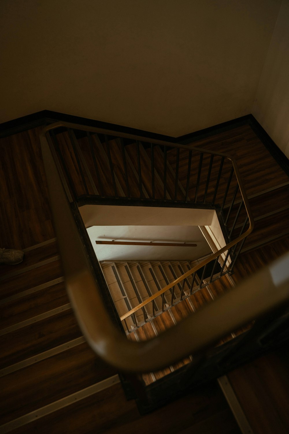a stair case with a mirror on the top of it