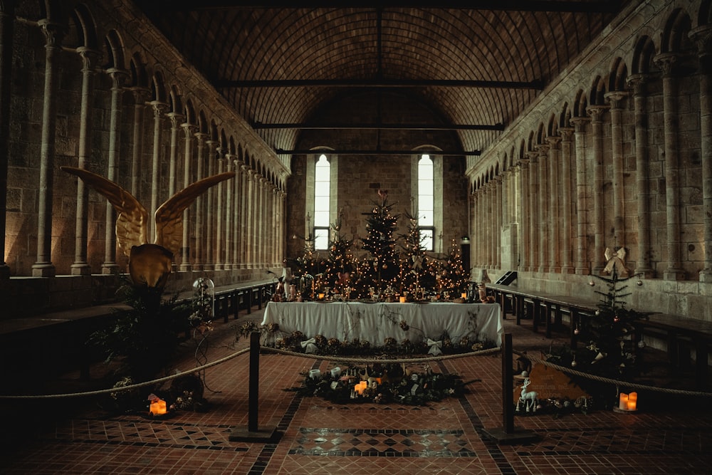 a large room with a christmas tree inside of it