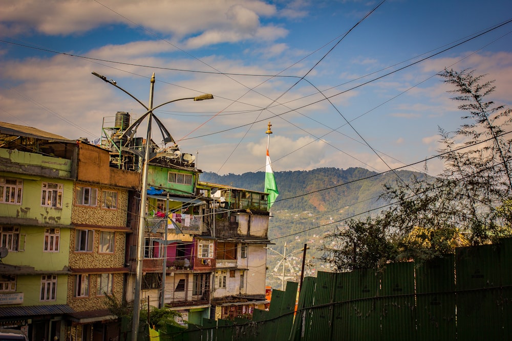 a view of a city with a green steeple