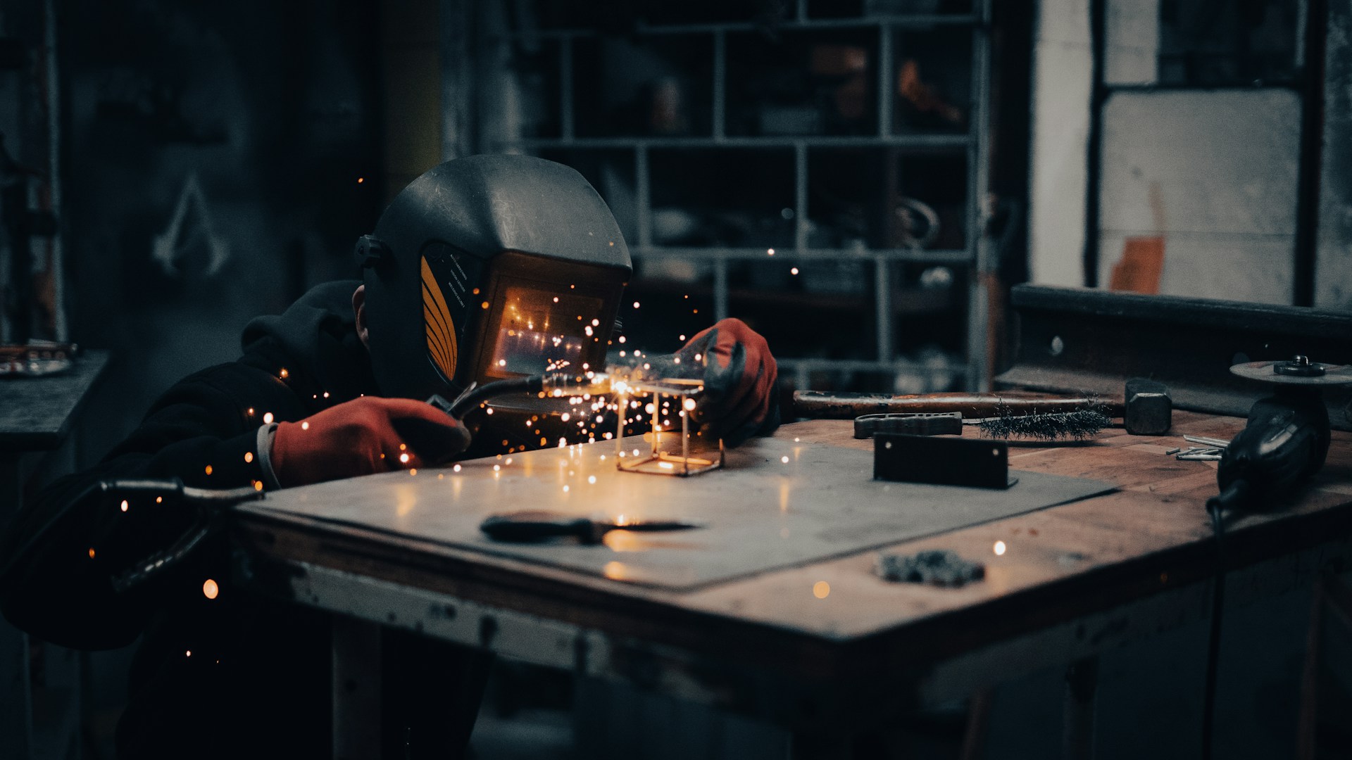 a welder working on a piece of metal