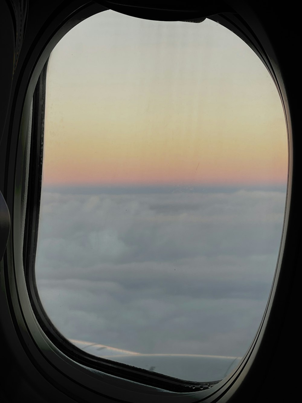 a view of the clouds from an airplane window