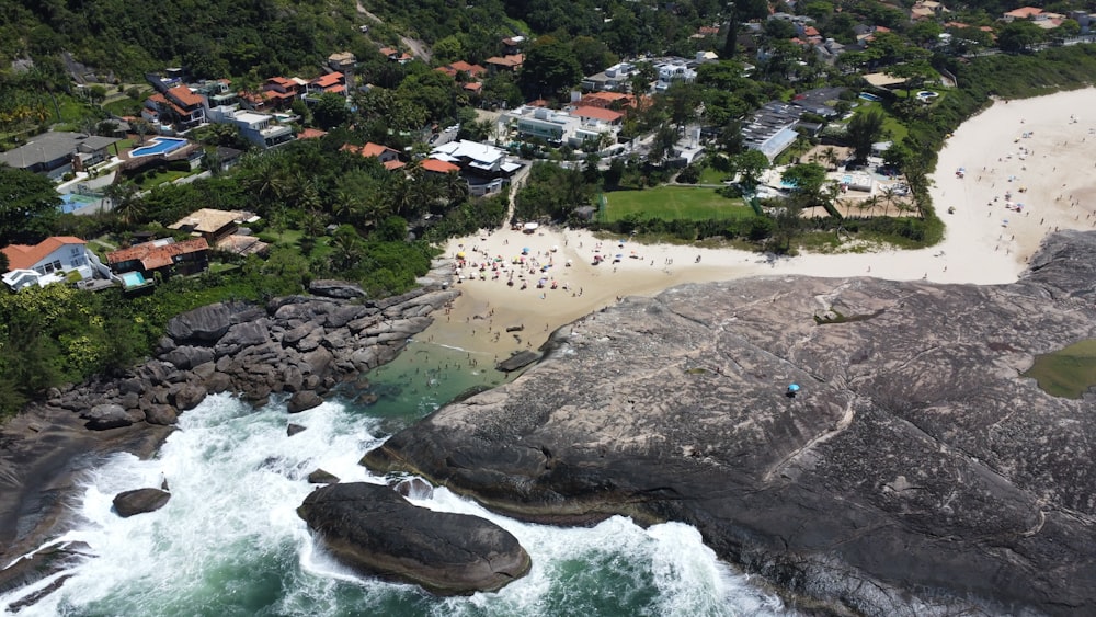 an aerial view of a beach and a city