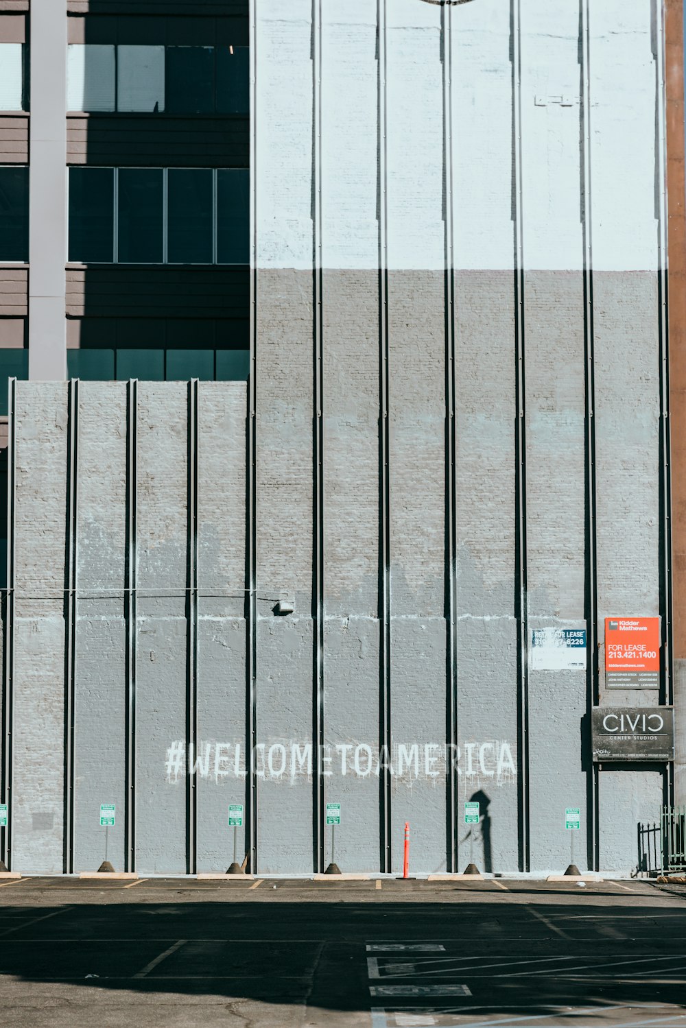 a tall building with graffiti on the side of it