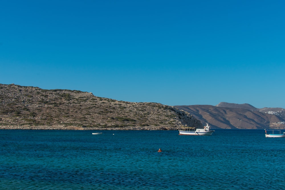 a body of water with boats floating on it