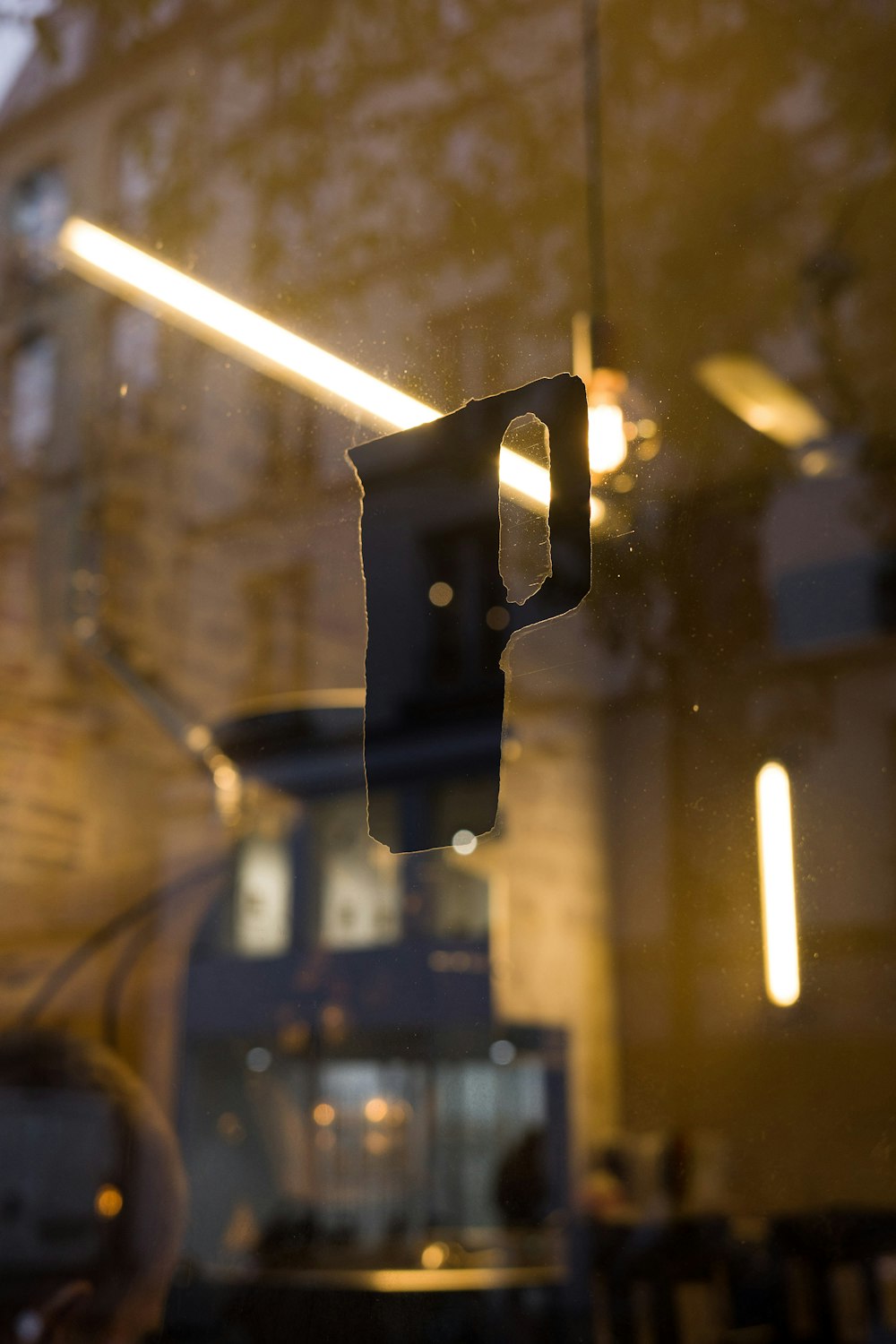 the reflection of a building in a window