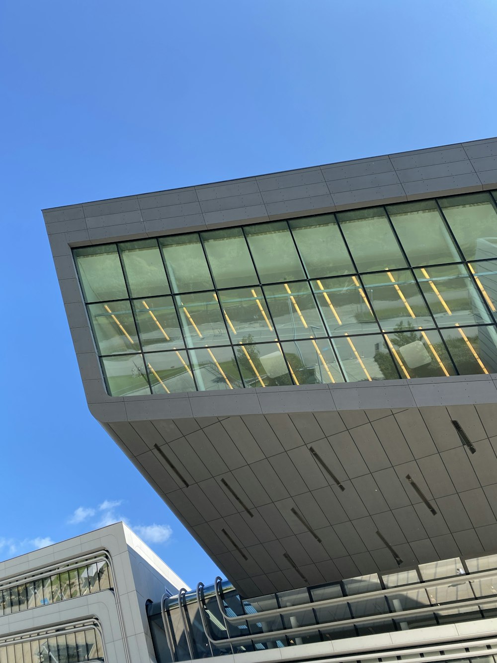 a tall building with a glass window on top of it