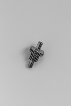 a black and white photo of a metal object