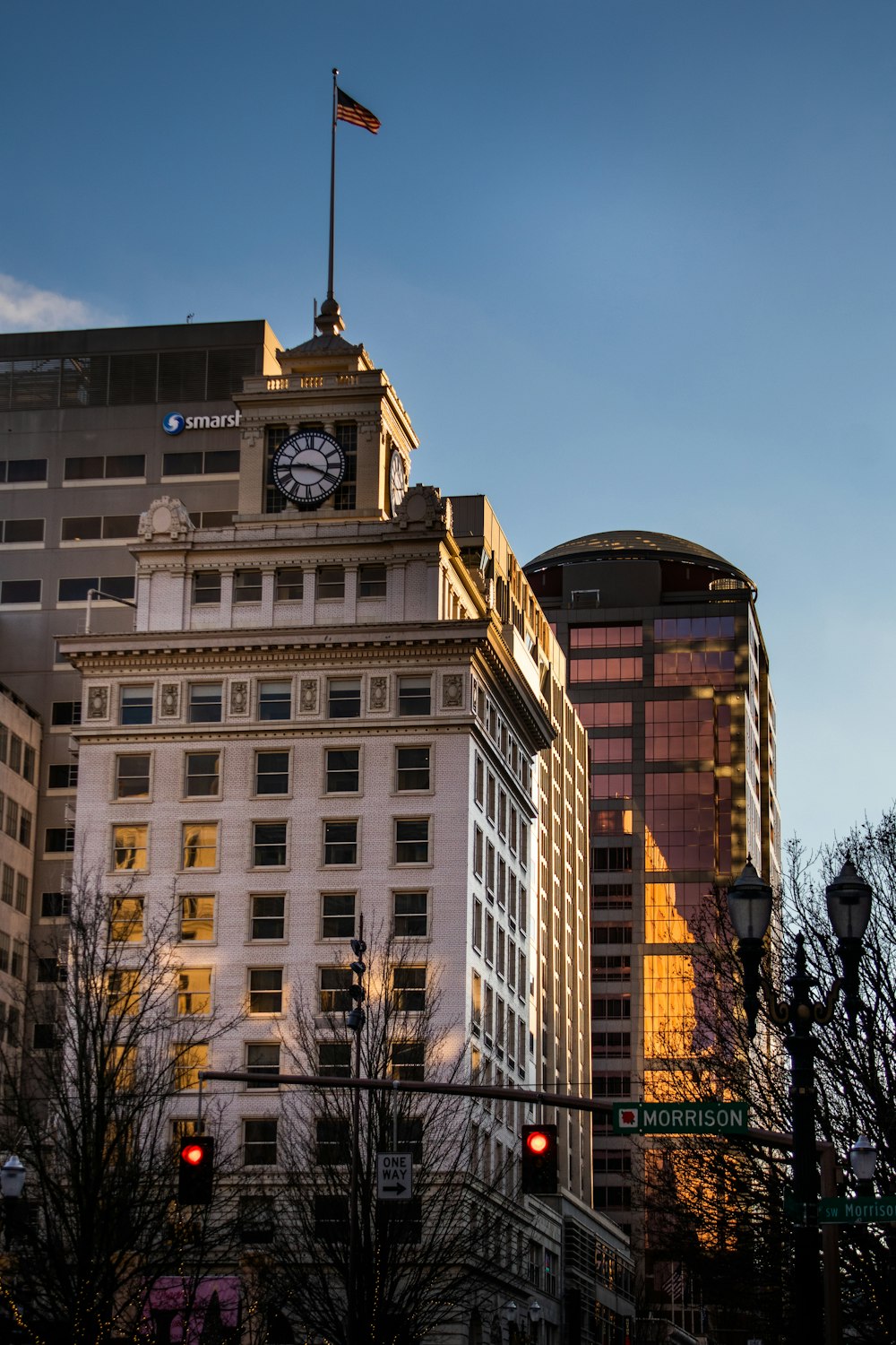 a tall building with a clock on the top of it