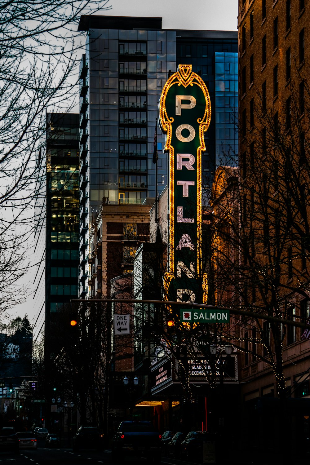 a large neon sign on the side of a building