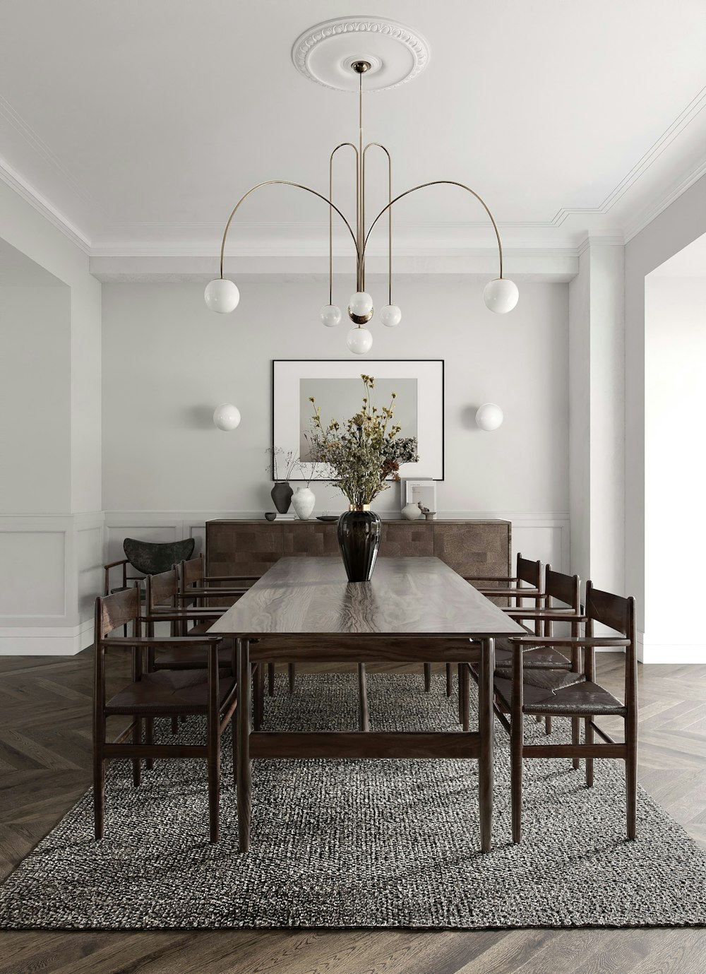 a dining room with a wooden table and chairs