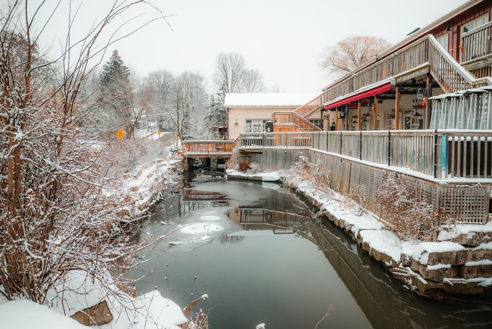 a river running through a snow covered park