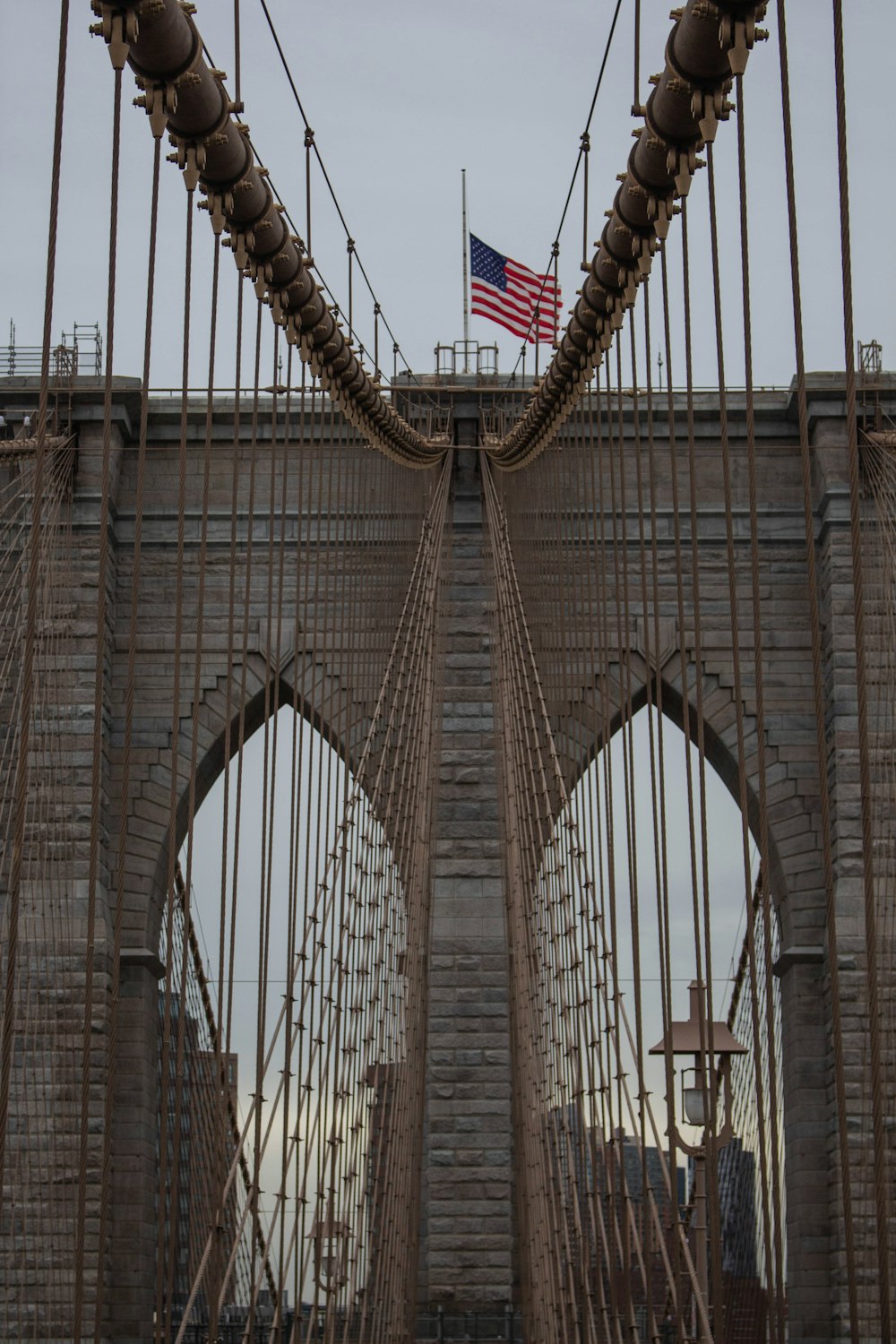 a view of a bridge with a flag on top of it