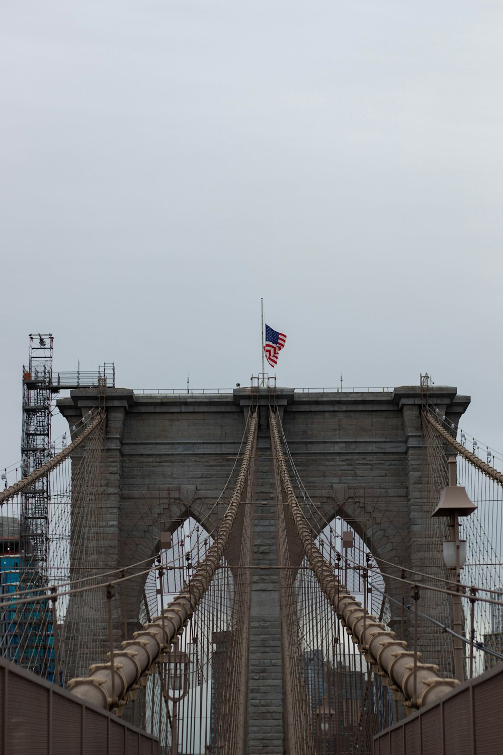 a view of a bridge with a flag on top of it
