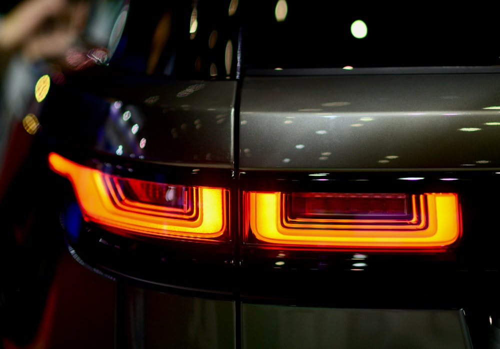 a close up of the tail lights of a car