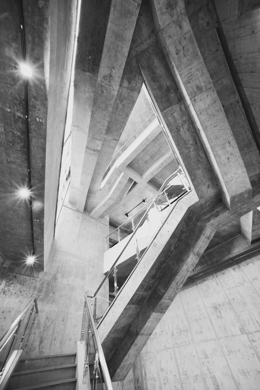 a black and white photo of a staircase