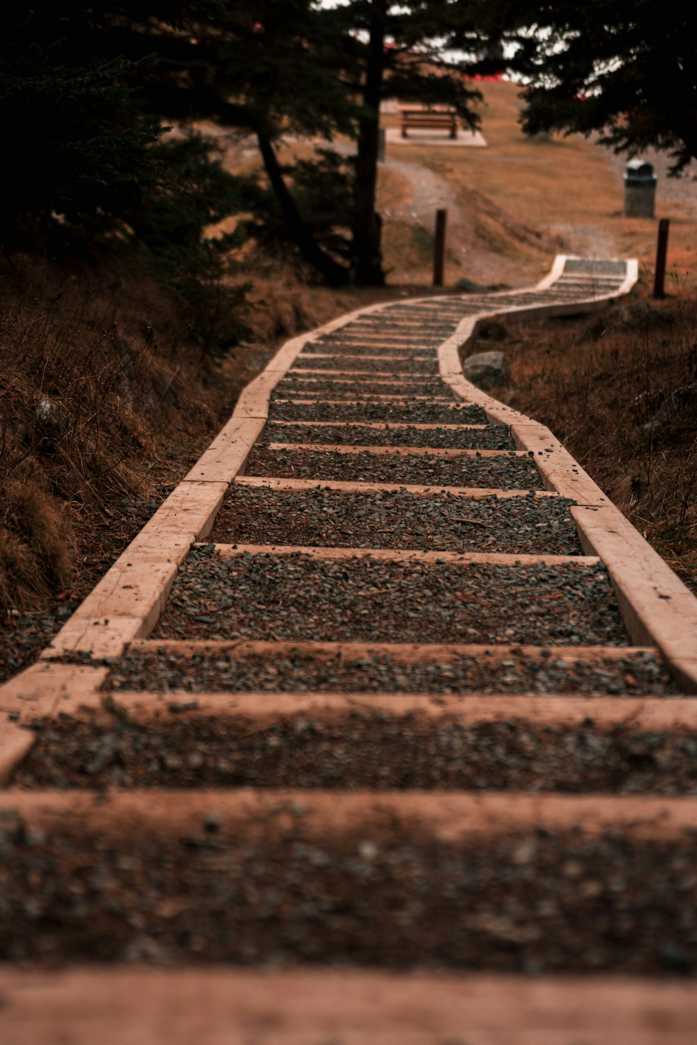 a set of stone steps leading up to a hill