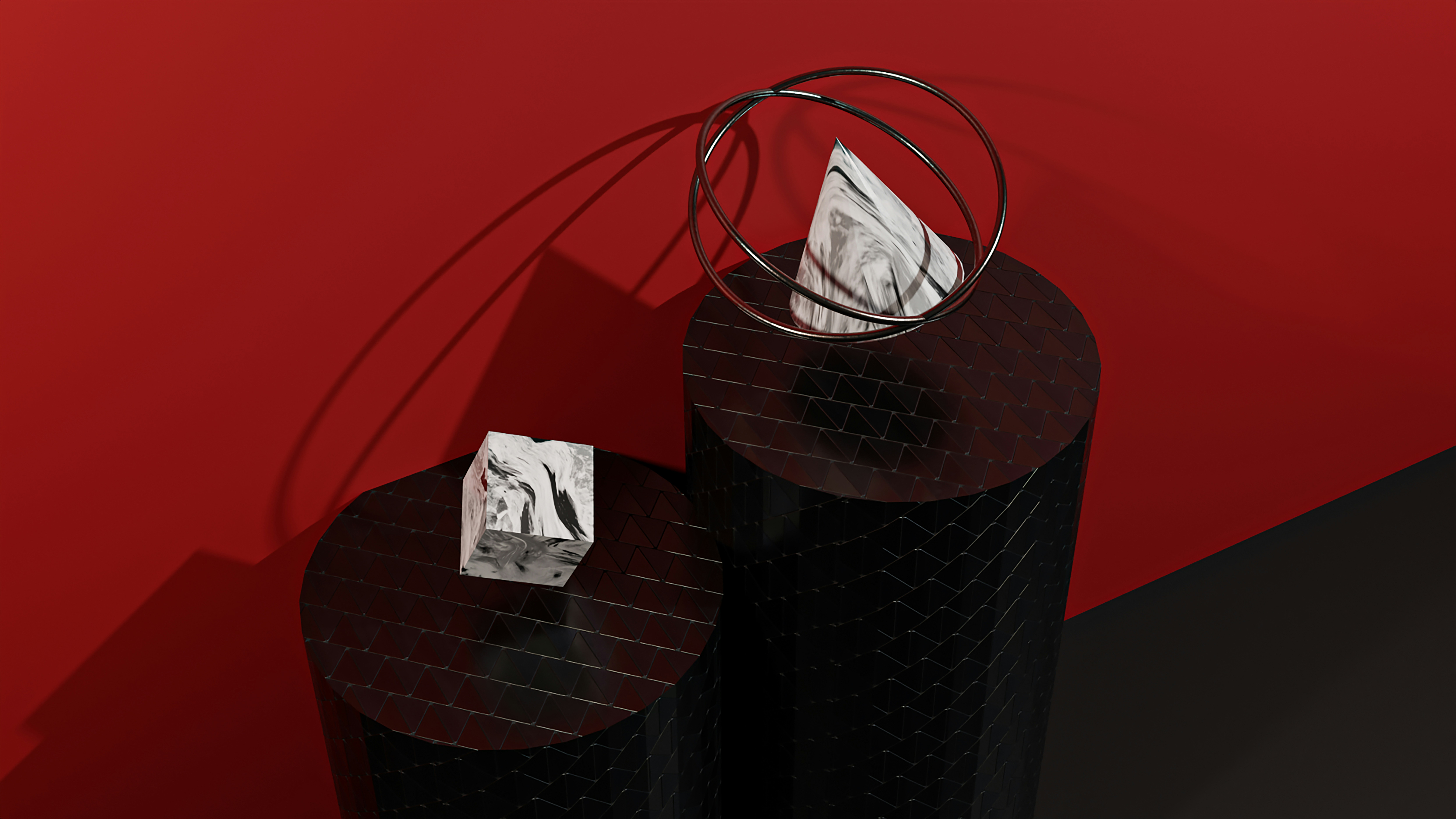 a pair of black vases sitting on top of each other