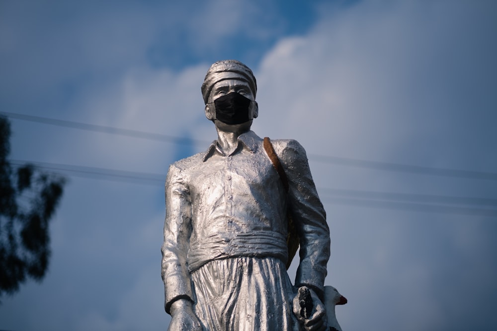 a statue of a man wearing a gas mask