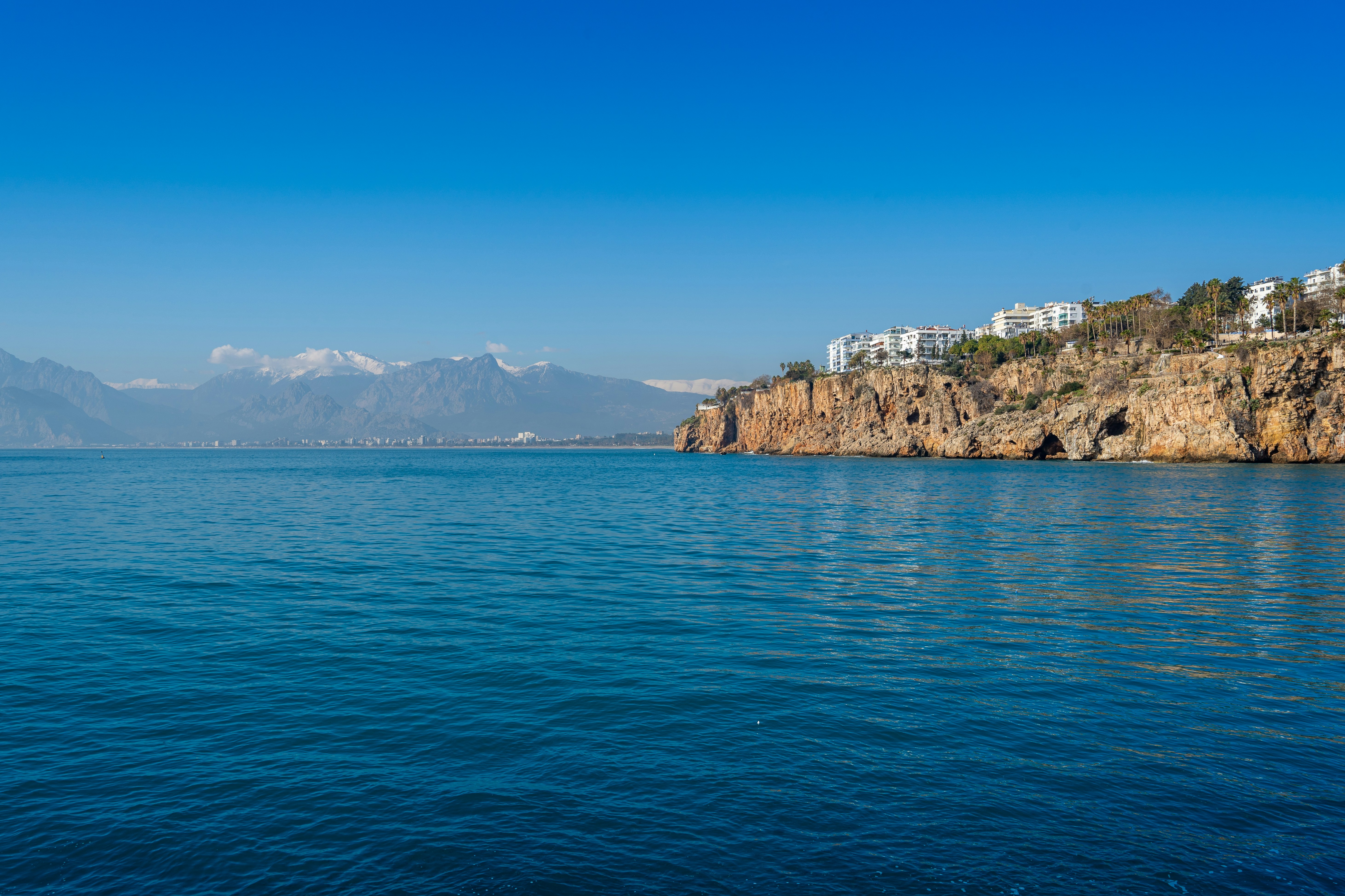 a large body of water with mountains in the background, Follow @isavelev on https://www.instagram.com/isavelev/ for more photos</p><p>