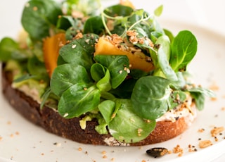 Vegan Cream Cheese & Avocado Toast with Lamb's Lettuce, Persimmon & Savory Granola by Bakd&Raw, Karolin Baitinger