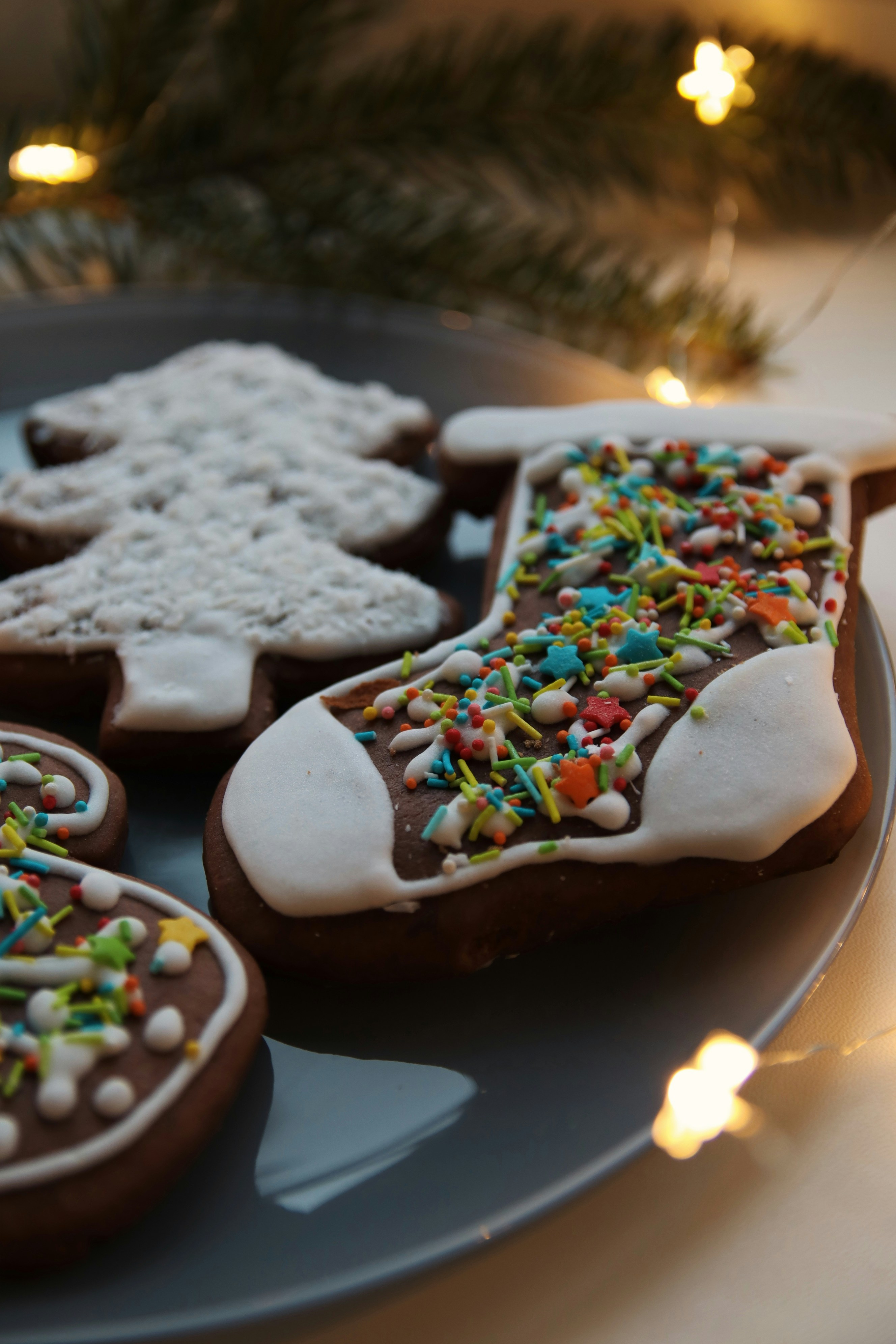 a plate of decorated cookies on a table